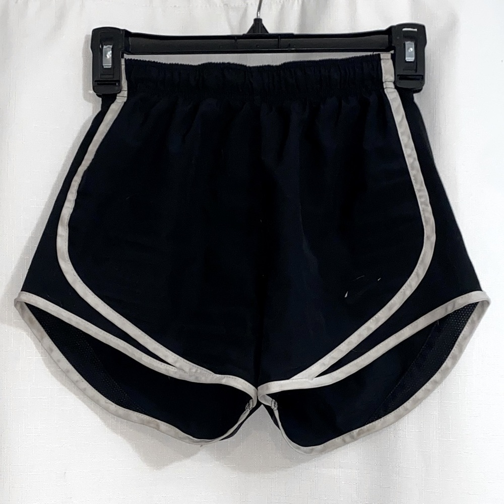 Black Nike shorts with white stripe